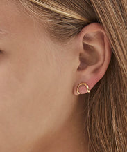 Load image into Gallery viewer, Hand made and fluid in shape, these fine golden earrings wraps around the lobe like a golden harness, exaggerating its curve. Made in Australia
