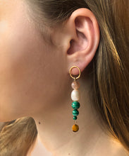 Load image into Gallery viewer, SOLSTICE ASYMMETRIC EARRINGS With its remarkable green colour and distinctive concentric  rings, malachite has a regal and mesmerising appearance.   Orbs of green malachite, pink moonstone and white pearl  make up the Solstice Asymmetric Earrings, creating a fresh  colourful expression for summer.