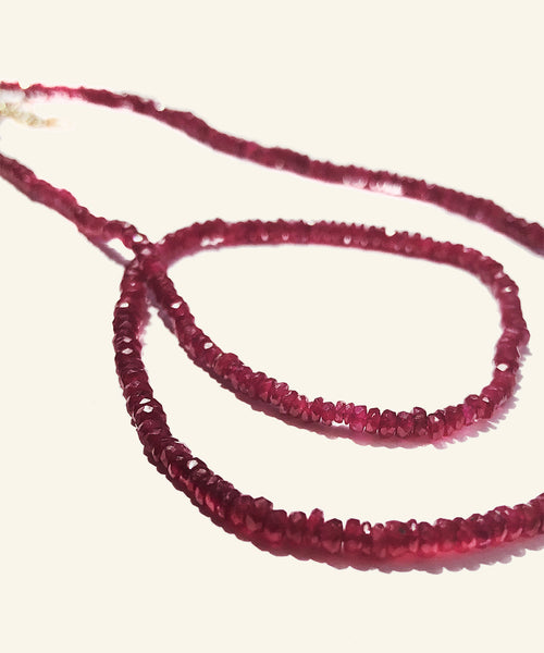 The arresting hue of this ruby necklace is both mesmerising and powerful. The colour of self confidence and fearlessness, rubies vibrate power, nobility and passion. Short and easy to wear this lustrous, elegant and exclusive row of intensity can be worn everyday. Make it your exclusive talisman and reminder of your own sovereignty.