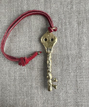 Load image into Gallery viewer, Skeleton Bag Charm. Brass
