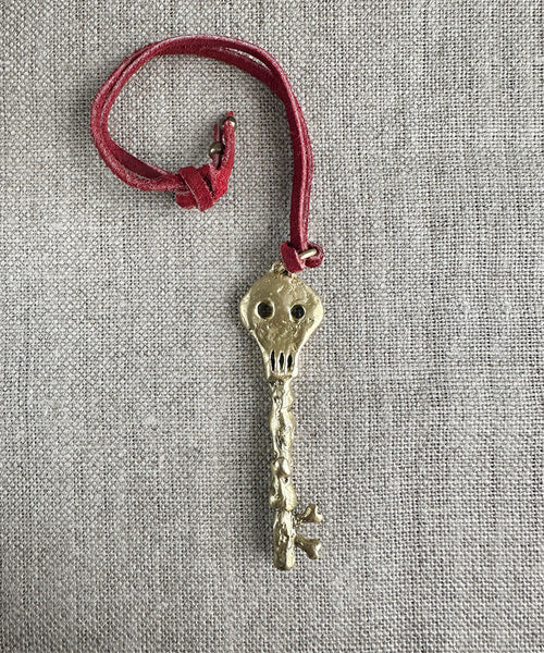 Skeleton Bag Charm. Brass