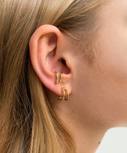 Load image into Gallery viewer, The Gold split earrings gives an illusion of wearing two rings at once. The golden line travels in an elegant curve under the lope and back again. Can be worn down or turned upside down.      18ct gold plated sterling silver. handmade in australia
